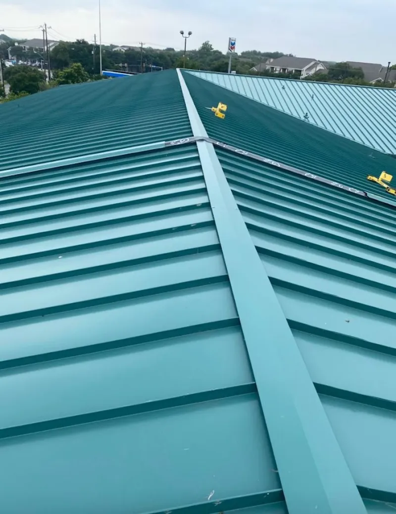 Green commercial metal roof ridge and valley for Metal Roof Repair in Fuller Heights